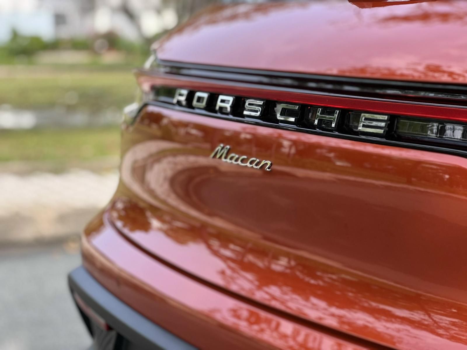 Porsche 2022 - Xe mới 100% chưa lăn bánh, màu cam cà rốt, nội thất đen chỉ cam, dây belt cam, full option