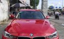 BMW 3 Series  320i  2012 - Bán BMW 3 Series 320i sản xuất 2012, màu đỏ, giá tốt