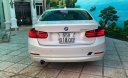 BMW 3 Series 320i 2012 - Bán xe BMW 320i màu trắng camay 2013 - 839 triệu