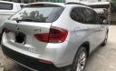 BMW X1 2012 - Cần bán BMW X1 sản xuất 2012, màu bạc, nhập khẩu, 586 triệu