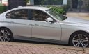 BMW 3 Series 320i 2014 - Cần bán gấp BMW 3 Series 320i năm 2014, màu bạc, nhập khẩu