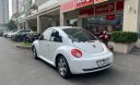Volkswagen Beetle   2010 - Bán Volkswagen Beetle 1.6AT sản xuất năm 2010, màu trắng, nhập khẩu  