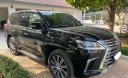Lexus LX 570 2017 - Cần bán lại xe Lexus LX 570 2017, màu đen, xe mới 99,999%, xe mới chạy 4,9 nghìn km, chưa một vết sơn