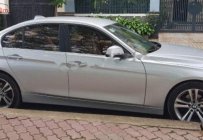 BMW 3 Series 320i 2014 - Cần bán gấp BMW 3 Series 320i năm 2014, màu bạc, nhập khẩu giá 810 triệu tại Tp.HCM