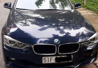 BMW 3 Series 320i 2015 - Bán BMW 320i sản xuất 2015, màu xanh đen, đi 36.000km, chính chủ bán giá 950 triệu tại Tp.HCM
