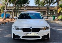 Cần bán xe BMW 3 Series sản xuất 2014, màu trắng, nhập khẩu nguyên chiếc giá cạnh tranh giá 920 triệu tại Tp.HCM