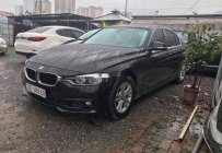 BMW 3 Series   2015 - Bán ô tô BMW 320i sản xuất 2015, màu đen, form 2016 giá 945 triệu tại Hà Nội