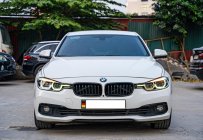 BMW 320i 2016 - Xe màu trắng giá 850 triệu tại Hà Nội